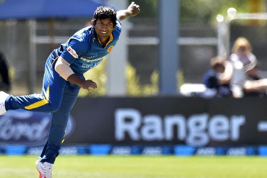 Sri Lanka's Jeevan Mendis bowls during the fifth One Day International cricket match between New Zealand and Sri Lanka in Dunedin at University Oval on Jan 23, 2015. -- PHOTO: AFP
