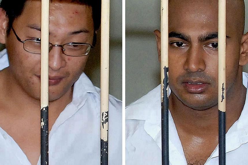 In this file combo photograph taken on Feb 14, 2006, Australian drug smugglers Andrew Chan (left) and Myuran Sukumaran, the ringleaders of the "Bali Nine" drug ring, are seen at a court holding cell during their trial in Denpasar, in Bali resort isla
