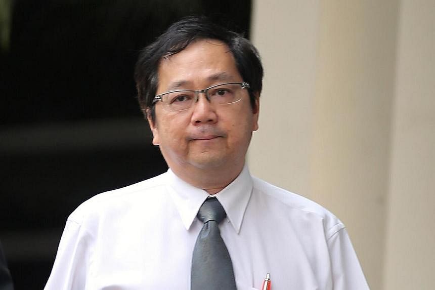 Dr Tan Gek Young&nbsp;was charged in the State Courts on Thursday with failing to keep proper records when dispensing a significant amount of cough medicine containing codeine. -- ST PHOTO: WONG KWAI CHOW