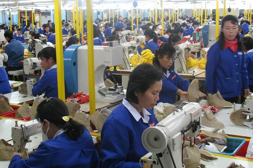 North Korean workers at a garment factory within the Kaesong Industrial Complex. North Korea notified South Korea on Thursday, Feb 26, 2015, of a raise in the minimum wage for workers in the joint complex, a unilateral move immediately rejected by Se