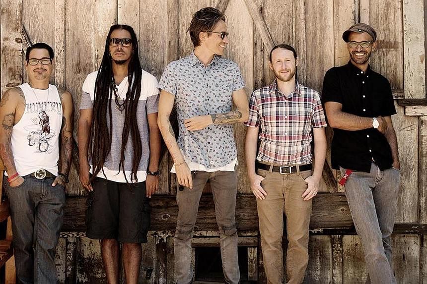 Incubus frontman and lead vocalist Brandon Boyd (centre) on the reunion of the five-man band, which comprise drummer (from left) Jose Pasillas, DJ Chris Kilmore, lead guitarist Mike Einziger and bassist Ben Kenney -- PHOTO: UPSURGE PRODUCTIONS