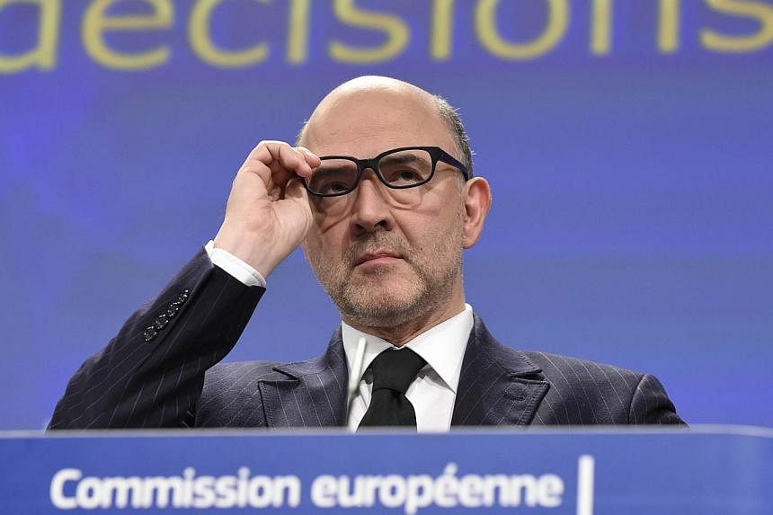 EU economic and financial affairs commissioner Pierre Moscovici gives a press conference on Feb 25, 2015 at the EU Parliament in Brussels. The EU on Feb 25 gave France a further two years until 2017 to bring its budget deficit back into line with Bru