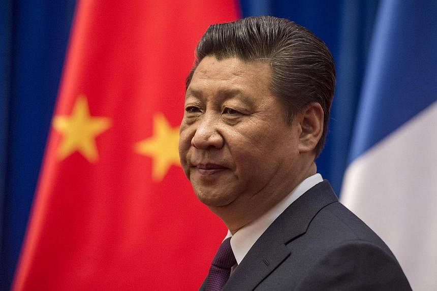 Mr Xi's best-known slogan so far has been his call for the "Chinese dream", an ambiguous catchphrase leaders have said refers to national rejuvenation in everything from ties with Taiwan to China's space programme. -- PHOTO: REUTERS