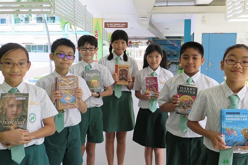Casuarina Primary pupils who will be taking part in the preliminary round of the National Spelling Championship on Mar 7. (From left) They are Aisyah Shaik Ahmed Ally, Poh Zhi Nan, Soh Jue Ning, Charmaine Lee, Tan Qian Xun, Muhammad Daanish Zuklife a