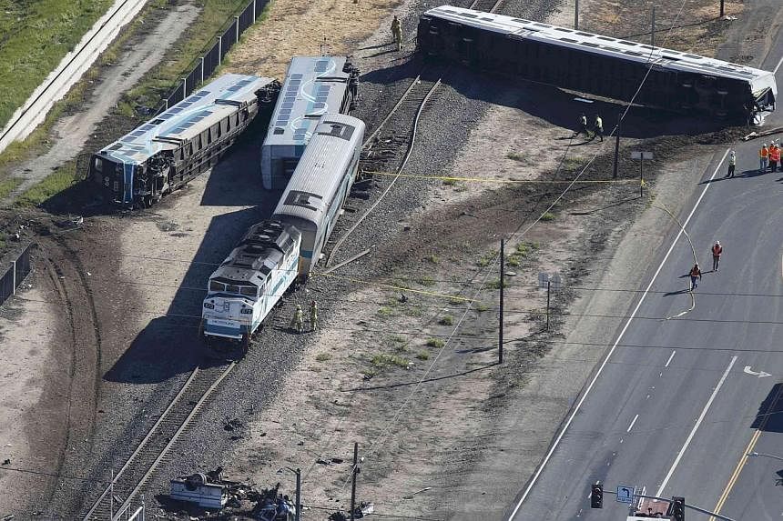 An aerial view of the scene of the train crash in Oxnard, California, on Feb 24, 2015. Video recorders on the train that struck a truck captured the crash, a federal official has said. -- PHOTO: REUTERS
