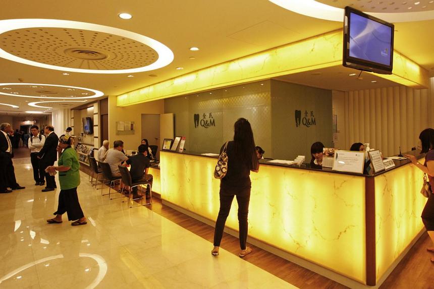 Q&M Dental earns one third more but halves final dividend The Straits