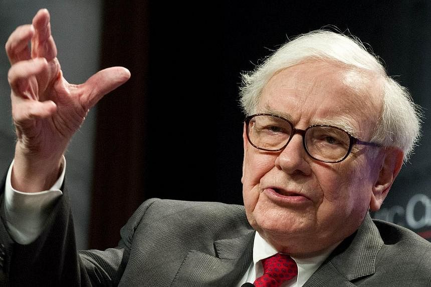 Warren Buffett, chief executive officer of Berkshire Hathaway Inc, told investors on Saturday that he has found his successor. -- PHOTO: AFP