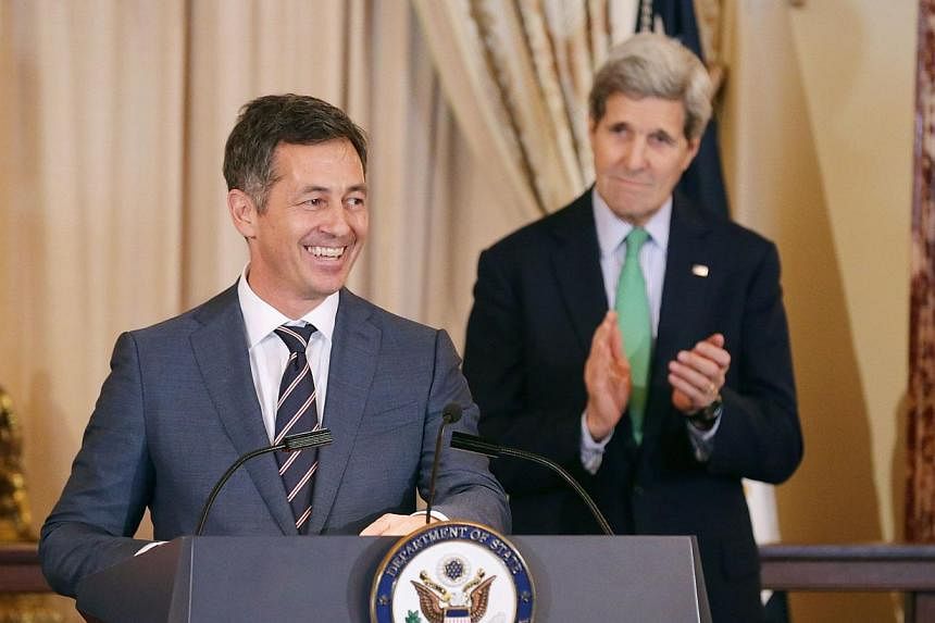 Mr&nbsp;Randy Berry (left), the first-ever Special Envoy for the Human Rights of Lesbian, Gay, Bisexual and Transgender Persons, delivers remarks during a reception in his honour with US Secretary of State John Kerry in the Ben Franklin Room at the D