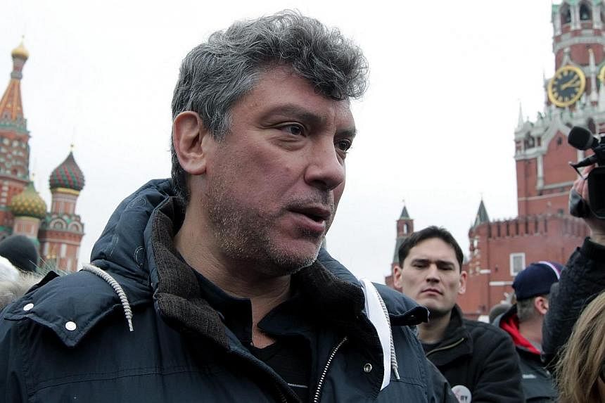 A file picture dated April 8, 2012 shows Leader of People's Freedom party Boris Nemtsov (centre) taking part in a protest against president-elect Vladimir Putin at the Red square in Moscow. United States President Barack Obama on Friday condemned the