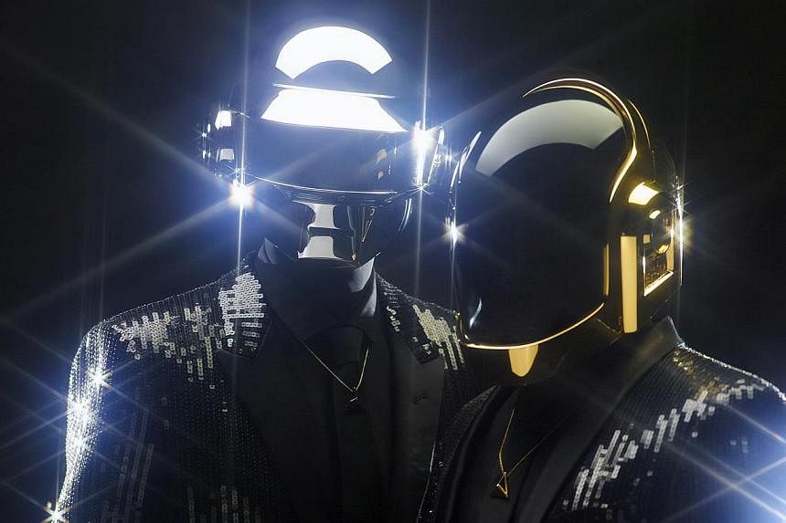 Daft Punk duo&nbsp;Guy-Manuel de Homem-Christo and Thomas Bangalter as they usually appear - in helmets. -- PHOTO: DAFT PUNK
