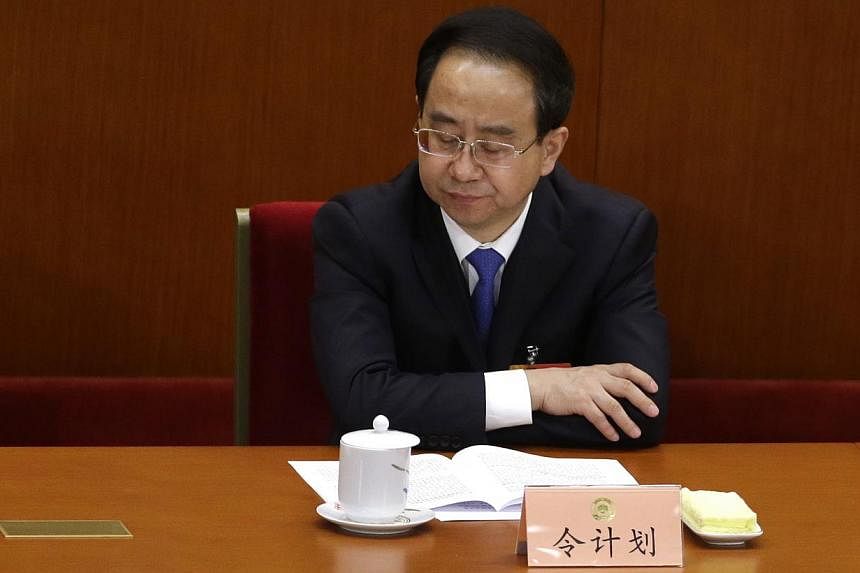 China expelled a disgraced senior aide to former President Hu Jintao from a high-profile advisory body on Saturday, the official Xinhua news agency reported on its website, marking the latest step in a significant political scandal. -- PHOTO: REUTERS