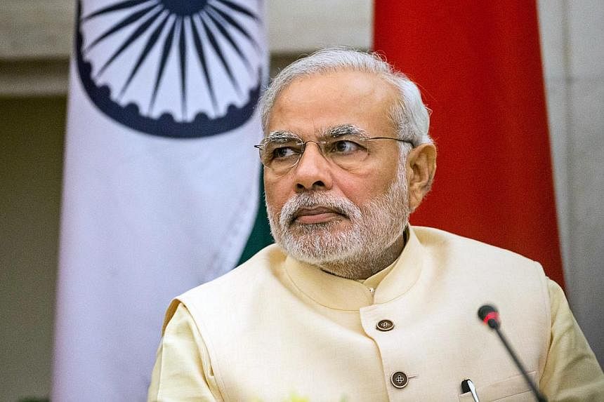 India Prime Minister Narendra Modi's Bharatiya Janata Party and the Peoples Democratic Party are expected to be officially sworn into office in Kashmir's winter capital of Jammu in a tightly secured ceremony. -- PHOTO: BLOOMBERG