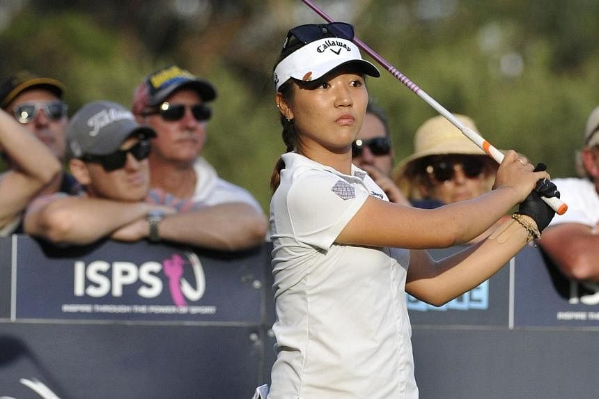 Lydia Ko of New Zealand hits a shot during the final round of the women's Australian Open golf tournament at the Royal Melbourne Golf Club in Melbourne on Feb 22, 2015. -- PHOTO: AFP