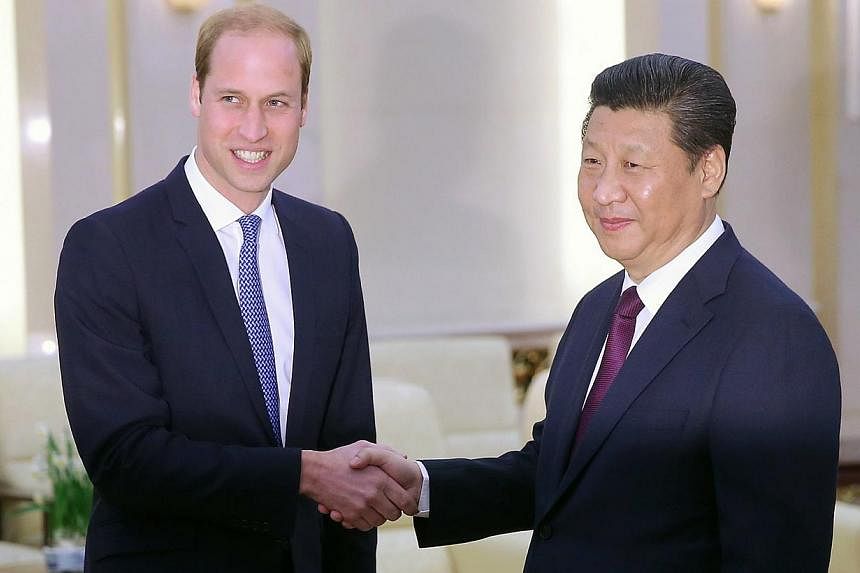 Britain's Prince William meets China's President Xi Jinping at the Great Hall of the People in Beijing on Mar 2, 2015. -- PHOTO: REUTERS