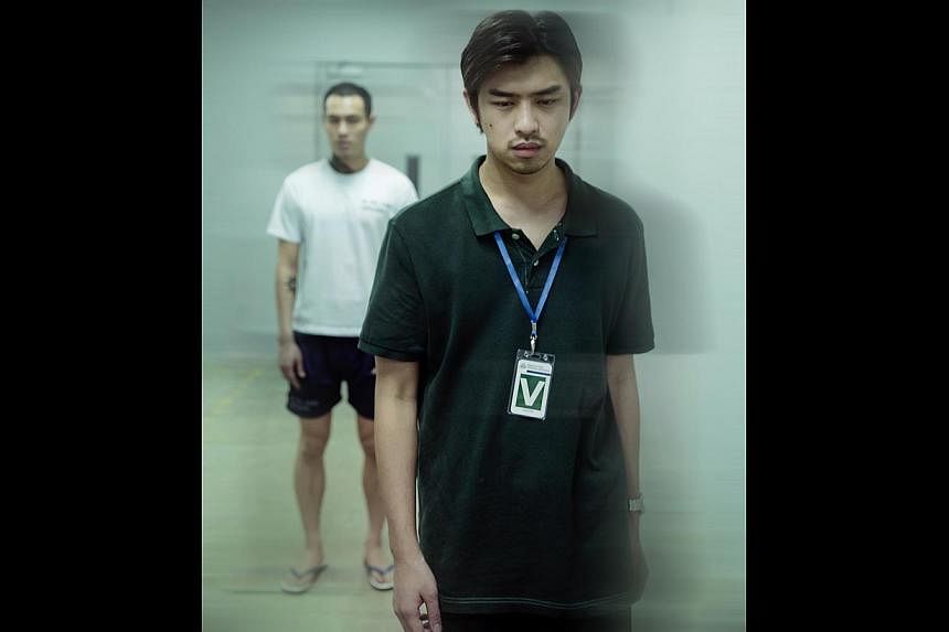 Chen Bo-lin (foreground) plays a young man visiting his friend, played by Tony Yang, in prison in one of the segments of Distance. -- PHOTO: GIRAFFE PICTURES