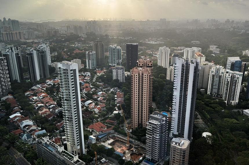 High-rise condominium buildings in the Singapore city centre and outskirt. Resale prices of non-landed private homes in Singapore continued to cool in January 2015, according to flash estimates from the National University of Singapore for its Overal