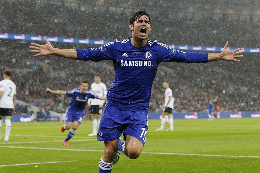 Chelsea forward Diego Costa celebrating after having a hand in his side's second goal against Tottenham Hotspur in the League Cup final at Wembley on March 1, 2015. -- PHOTO: REUTERS