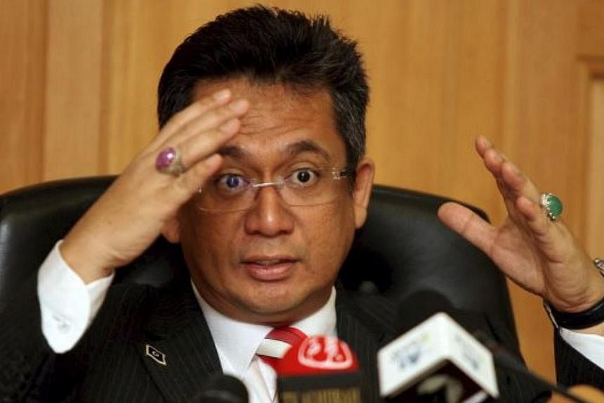 Terengganu Chief Minister Ahmad Razif Abdul Rahman (above) has denied reports that the state issued a dress code on tourists barring them from wearing revealing attire. -- PHOTO:&nbsp;THE STAR/ASIA NEWS NETWORK