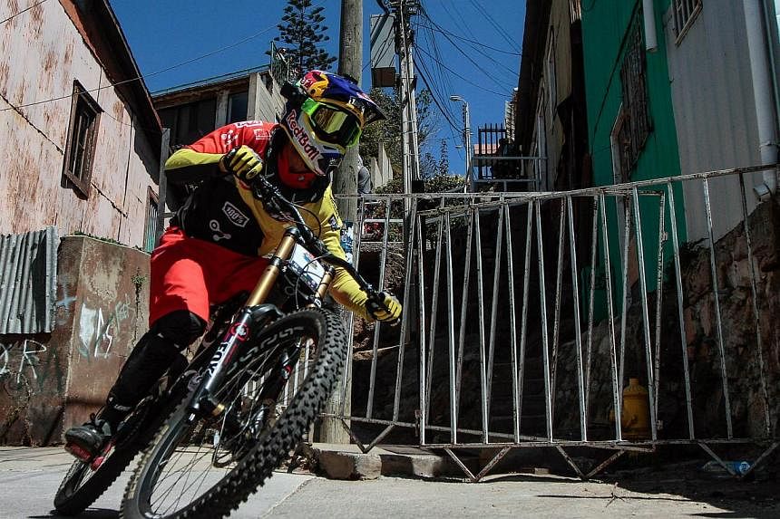 Slovak Filip Polc competing in the Red Bull Valparaiso Cerro Abajo downhill mountain bike race in Valparaiso, Chile, on March 1, 2015.&nbsp;-- PHOTO: EPA&nbsp;