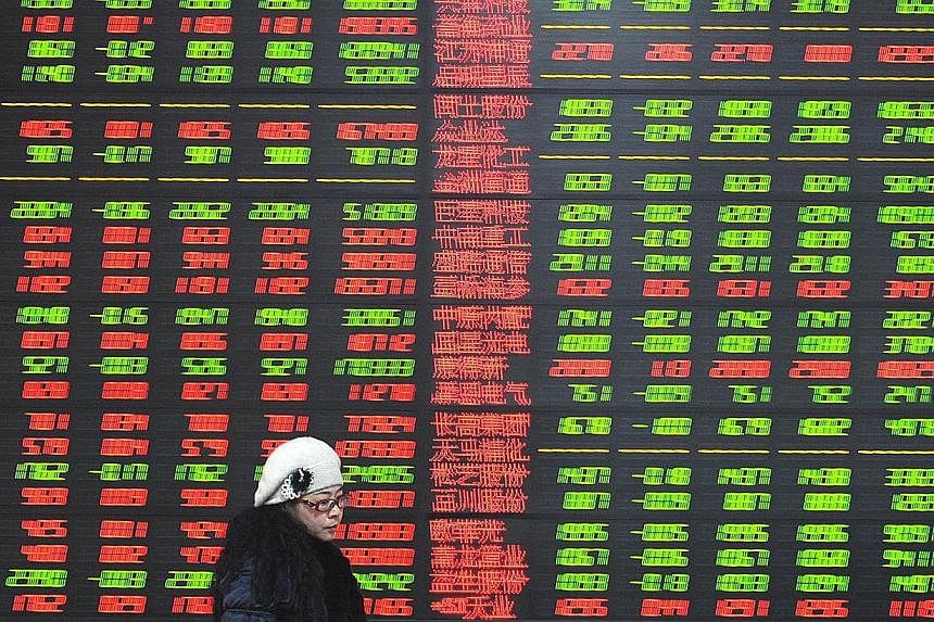 Almost two shares rose for each that fell, as the MSCI Asia Pacific Index added 0.2 per cent to 146.44 as of 9:08 a.m. in Tokyoon Monday. -- PHOTO: AFP