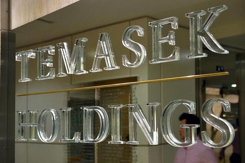 Temasek reported a total shareholder return of 1.5 per cent for the 12 months ended March 31, down from 8.9 per cent in the previous year and an average 16 per cent a year since its inception in 1974. -- PHOTO: ST FILE