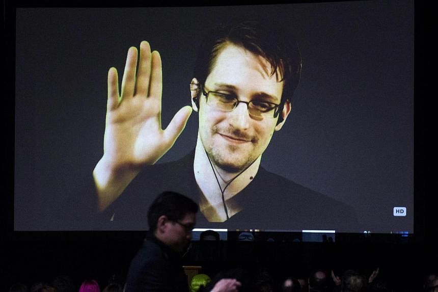 Former US National Security Agency contractor Edward Snowden appears live via video during a student organised world affairs conference at the Upper Canada College private high school in Toronto on Feb 2, 2015. The fugitive whistleblower now wishes t