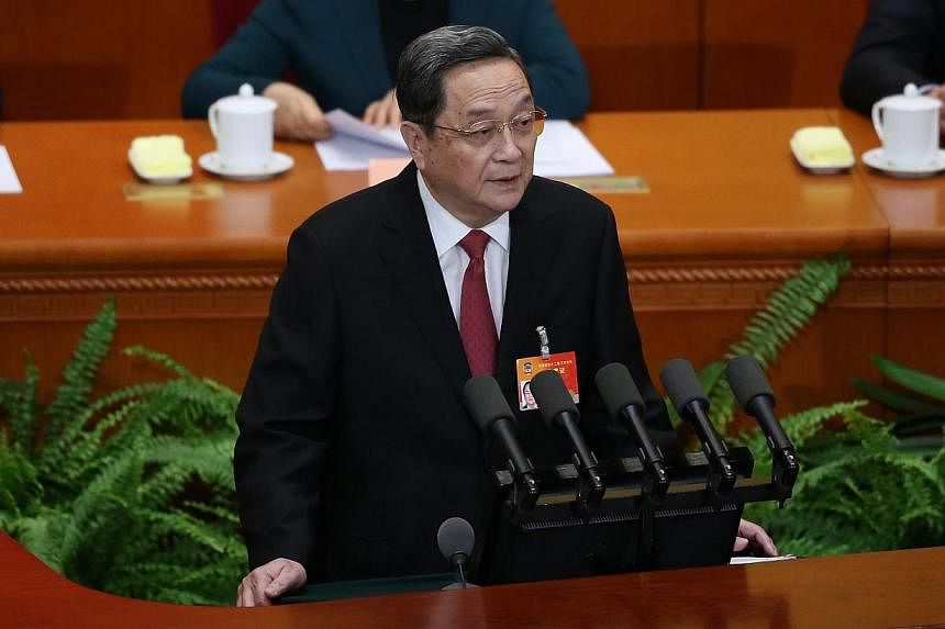 Mr&nbsp;Yu Zhengsheng, chairman of the National Committee of the Chinese People's Political Consultative Conference (CPPCC), delivers his speech during the opening session of the third plenum of the 12th National CPPCC at the Great Hall of the People