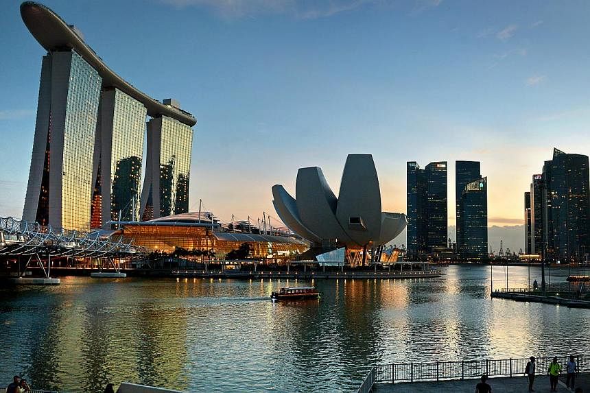Singapore's Marina Bay area and financial district. Singapore is the world's most expensive city for the second year running, according to the Economist Intelligence Unit (EIU). -- ST PHOTO: KUA CHEE SIONG