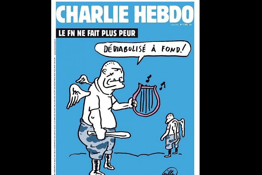 A handout image made available by Charlie Hebdo on Monday shows the cover of the forthcoming edition of the satirical weekly which will be released on Wednesday. It takes a dig at the country's far-right National Front by showing two thuggish skinhea