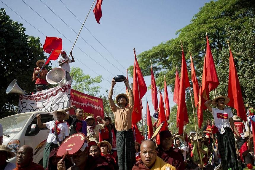 Myanmar students shout slogans during a protest march in Letpadan town, some 130km north of Myanmar's main city Yangon on March 4, 2015. -- PHOTO: AFP