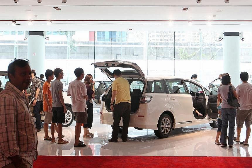 Assuming a vehicle has an open market value of $30,000, it should attract $2,100 in GST. But after the 20 per cent excise duty is applied, the car costs $36,000, and its GST becomes $2,520 - $420 more.&nbsp;-- ST PHOTO: ONG WEE JIN, ST FILE