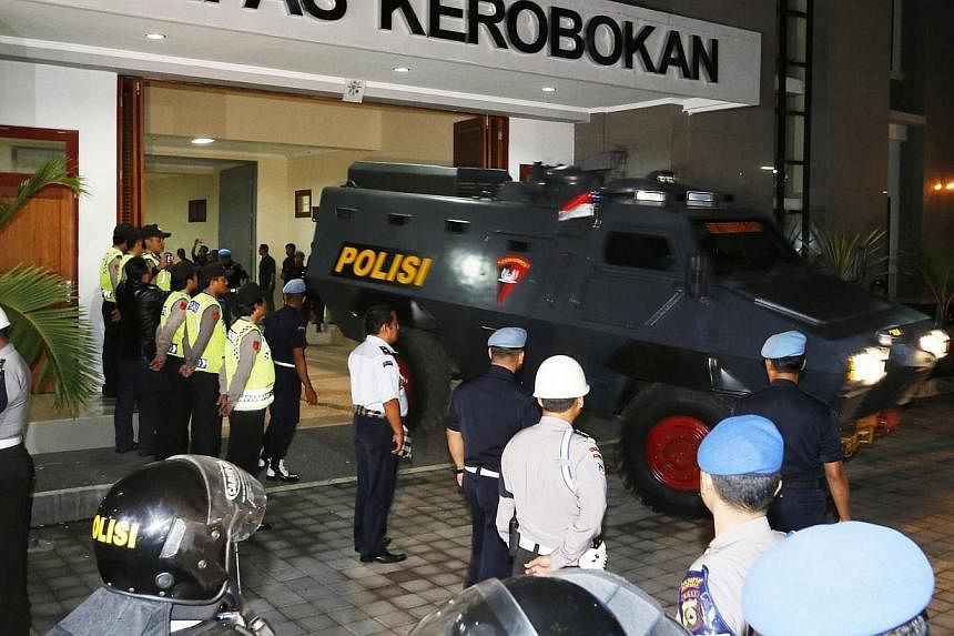 An amoured vehicle, believed to be carrying Australian death row prisoners Myuran Sukumaran and Andrew Chan, leaving Kerobokan Prison for the airport in Denpasar, Bali, on March 4, 2015. -- PHOTO: REUTERS