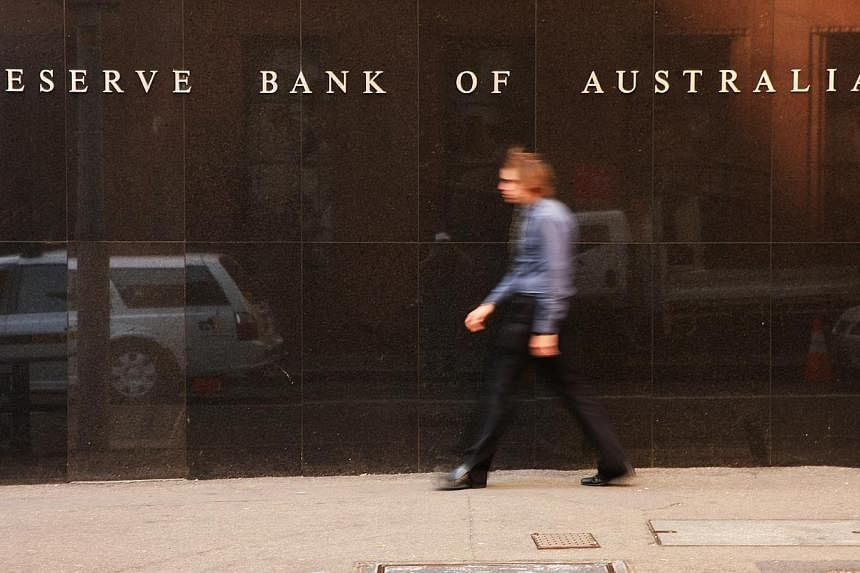 The Reserve Bank of Australia's headquarters in Sydney. The Australian Securities &amp; Investments Commission will look into a curious spike in the local dollar moments before the central bank announced its rate decision the previous day. -- PHOTO: 