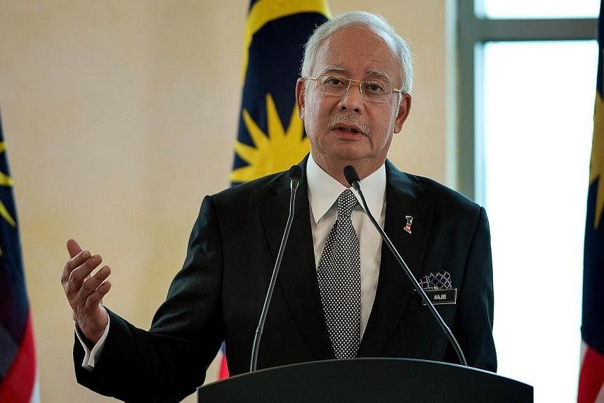 Malaysia's PM Najib Razak said that he has instructed the country's Auditor General to independently verify the accounts of state development company 1Malaysia Development Bhd (1MDB). -- PHOTO: AFP&nbsp;
