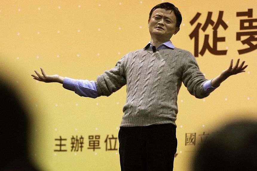 Alibaba Group Executive Chairman Jack Ma reacts while giving a speech at National Taiwan University in Taipei on March 3, 2015. Taiwan has snubbed a multi-million dollar funding pledge by China's e-commerce giant Alibaba designed to encourage the isl