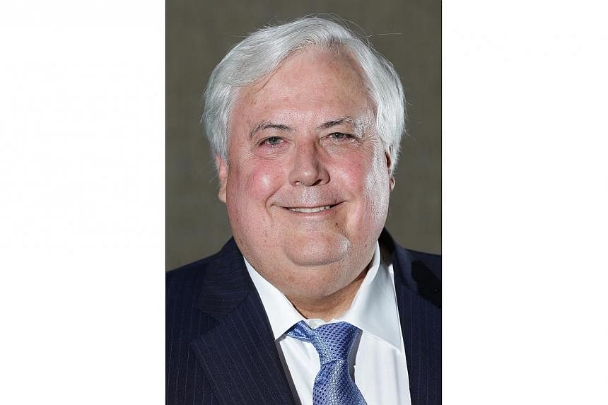 Flamboyant mining billionaire Clive Palmer has apologised after coming under fire for suggesting Australian Prime Minister Tony Abbott commit suicide. -- PHOTO: BLOOMBERG&nbsp;