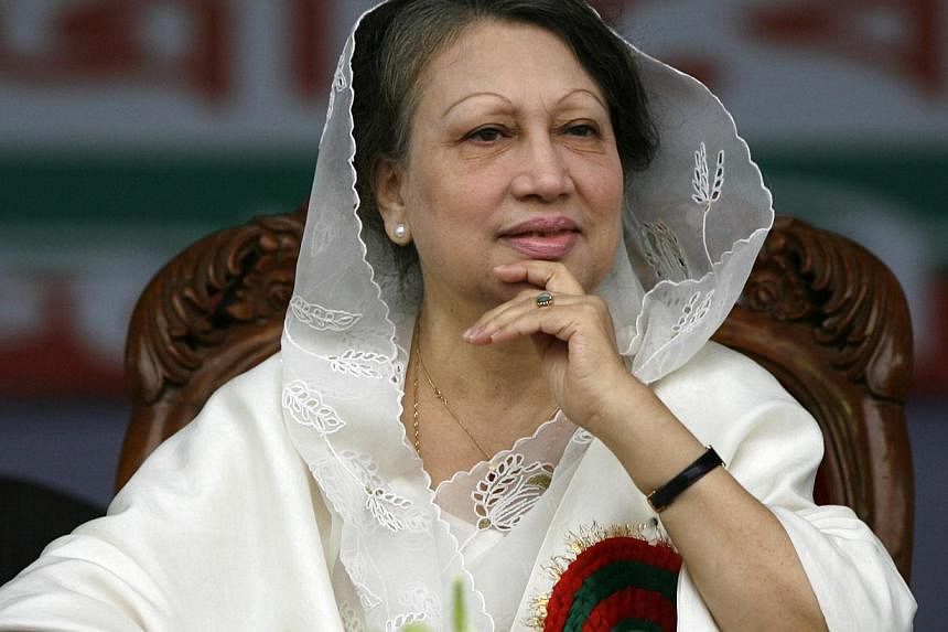 A Bangladeshi court on Wednesday upheld arrest warrants against opposition leader Begum Khaleda Zia (above) and called her a fugitive after she again failed to appear to face graft charges that have stoked political tensions. -- PHOTO: REUTERS