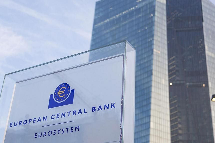 A sign sits outside the new headquarters of the European Central Bank (ECB) in Frankfurt, Germany, on Feb 13, 2015. Keen to keep a low profile over the Greek crisis, the ECB will focus on improved growth prospects when it meets on Thursday and unveil