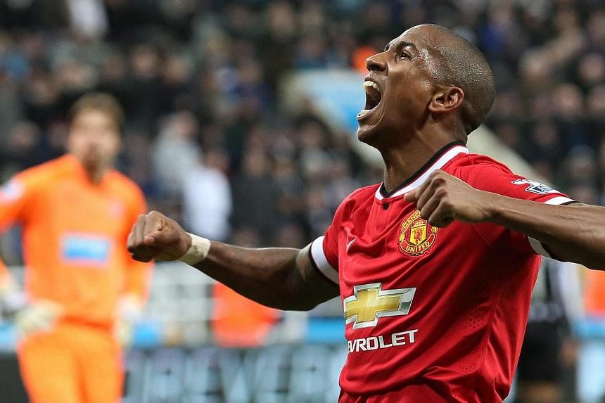 Manchester United's Ashley Young celebrating his winning goal against Newcastle United at St James' Park on March 4, 2015. -- PHOTO: EPA&nbsp;