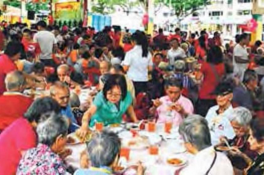 Man Fut Tong Welfare Society, which organised a Chinese New Year dinner for 1,100 seniors on Sunday, received 300 tins. -- PHOTO: FOOD BANK SINGAPORE S