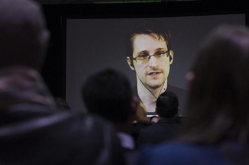 Former US National Security Agency contractor Edward Snowden appearing in a video during a conference at a high school in Toronto in this Feb 2, 2015 photo. Documents released by Snowden say New Zealand has been spying electronically on its Pacific I