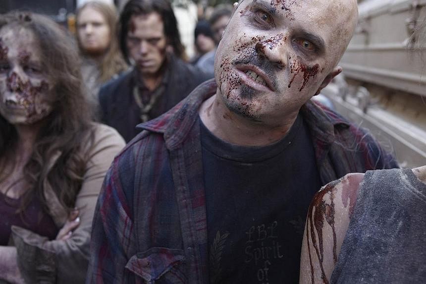Television still of popular US TV show The Walking Dead. A study by Cornell University in New York state suggests that Americans living in the Rockies stand a better chance of dodging a zombie apocalypse than their urban counterparts. -- PHOTO: FOX I