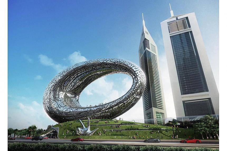 A handout computer generated image made available by the Dubai government on March 4, 2015, shows the exterior of the Museum of the Future that will be built on a main road of Dubai, at an estimated cost of $185 million. The structure will be finishe