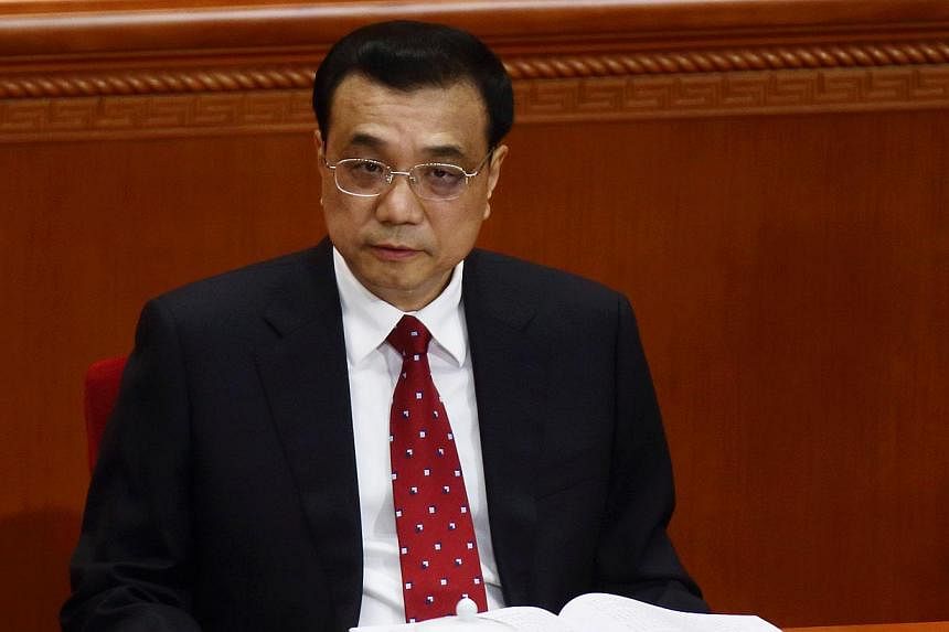 Li Keqiang, China's premier, attends the opening of the Chinese People's Political Consultative Conference (CPPCC) at the Great Hall of the People in Beijing, China, on Tuesday, March 3, 2015. -- PHOTO: BLOOMBERG