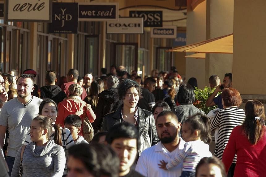 People shop during day after Christmas sales at Citadel Outlets in Los Angeles, California on Dec 26, 2014. -- PHOTO: REUTERS&nbsp;