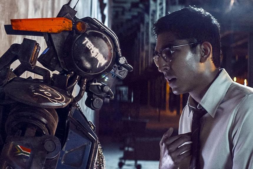 When Deon (Dev Patel) creates a new algorithm and uploads it into a robot, Chappie (Sharlto Copley) - who is capable of learning and feeling - is born. -- PHOTO: SONY PICTURES