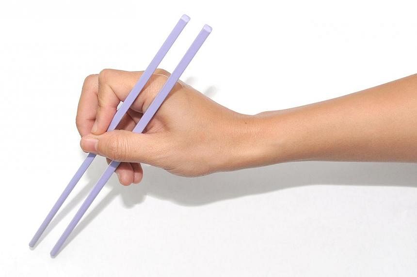 If you want to control your blood sugar levels, one effective way could be to eat rice with chopsticks, say local nutrition experts. -- ST PHOTO:&nbsp;JAMIE KOH&nbsp;