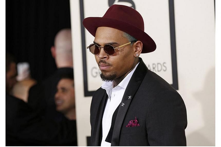 Singer Chris Brown arrives at the 57th annual Grammy Awards in Los Angeles, California on Feb 8, 2015.&nbsp;Chris Brown is reportedly a father. TMZ reported on Tuesday that Brown is the father of a nine-month old baby girl with a 31-year old former m