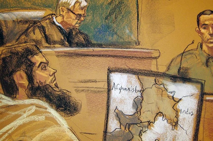 Abid Naseer (left) listens to testimony from Najibullah Zazi (right) as US District Judge Raymond Dearie looks on in this courtroom sketch in Brooklyn, New York Feb 17, 2015. Naseer&nbsp;was convicted on Wednesday on US charges of participating in an