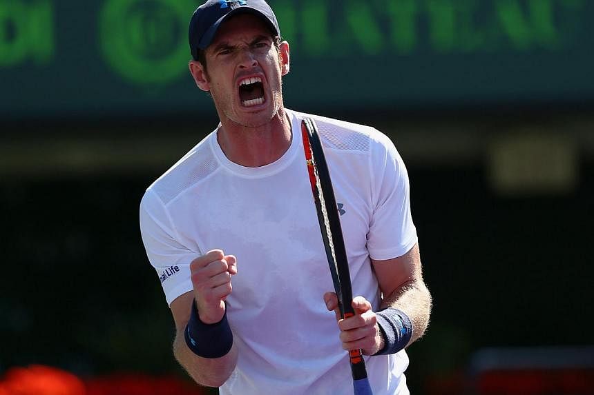 Andy Murray of Great Britain celebrates a point against Kevin Anderson of South Africa in their fourth round match at the Miami Open &nbsp;on March 31, 2015. &nbsp;Murray won the 500th match in his career after beating Kevin Anderson 6-4 3-6 6-3 on T